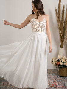 Delicate boho wedding dress for a women who wants to feel free and comfortable