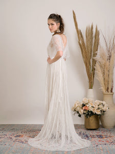 Bohemian wedding dress handmade from delicate lace and golden lining