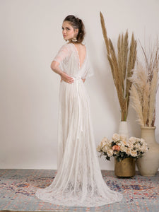 Bohemian wedding dress handmade from delicate lace and golden lining