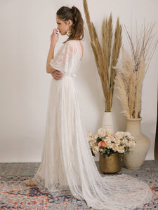 Bohemian wedding dress handmade from delicate lace and golden lining